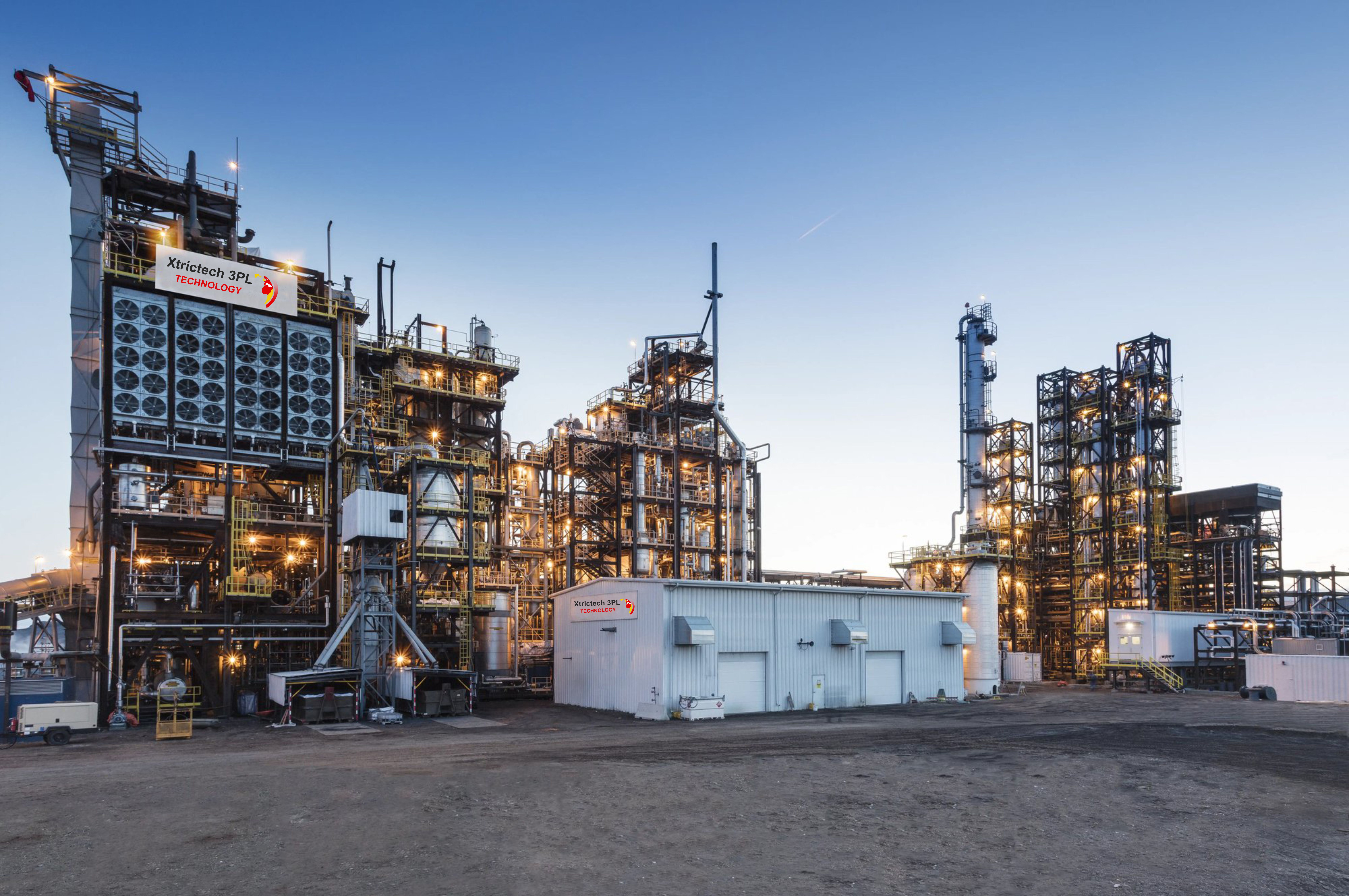 a large industrial plant with lights